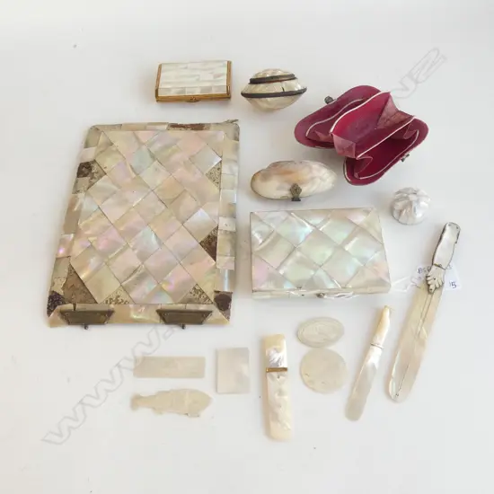A collection of mother of pearl items.